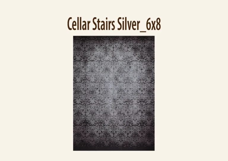 A gray damask-patterned photography backdrop with intricate floral and vine motifs.