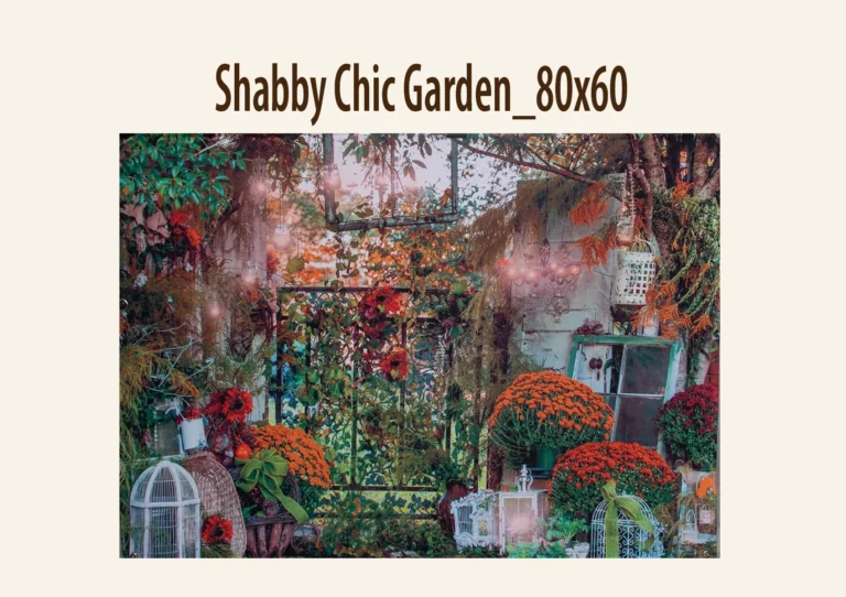 A garden-themed photography backdrop with flowers, foliage, a decorative gate, birdcages, and a metal chandelier.