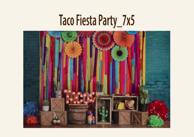Colorful fiesta-themed backdrop with bright paper streamers, decorative fans, cacti, wooden crates, maracas, a piñata, and a lit “TACOS” sign against a blue brick wall.